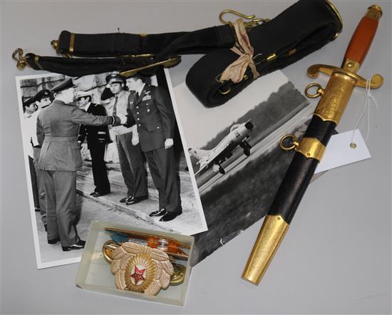 A 20th century Russian Army dagger, Naval belt, badges and insignia including photos etc